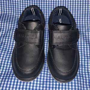 Boy’s Nautica dress shoes with Velcro straps.